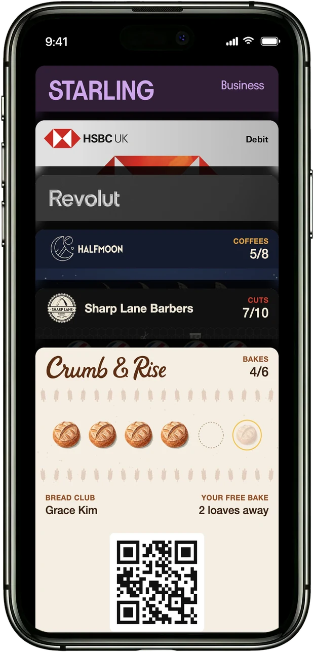 The card stacked in Apple Wallet next to bank cards
